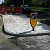 Construction of new island on Dame Dorothy Street, linked to the new signalised junction on Church Street North. 