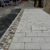 New paving outside the Monkwearmouth Museum, showing the improvements of new against old. Please note that the remaining footway will be renewed in line with the improvements to the North Bridge Street / Dame Dorothy Street junction later this year.