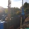 Construction of the retaining wall on Dame Dorothy Street to facilitate future road widening. Sheet piles are being pushed 13 metres into the ground to support the widened road.