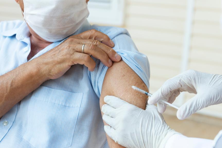 stock image of someone being vaccinated stock image of someone being vaccinated