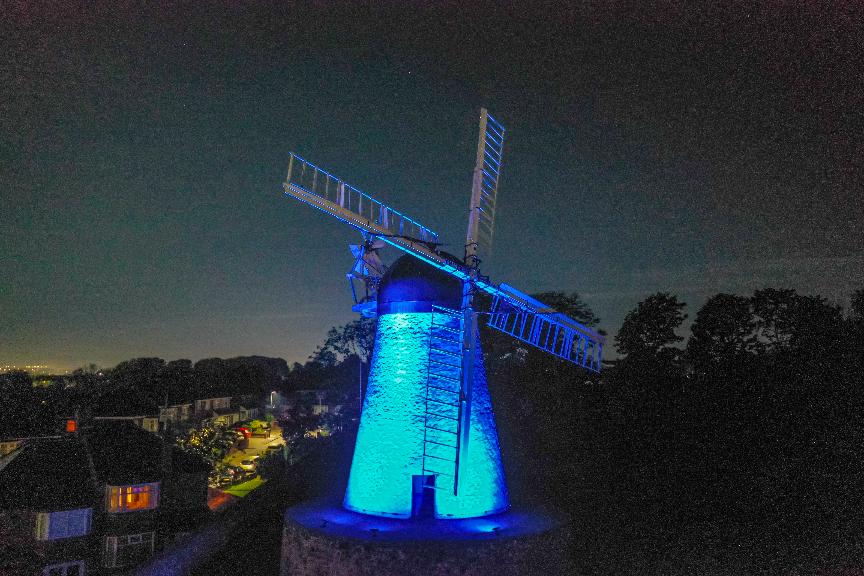 Fulwell Mill lit up blue
